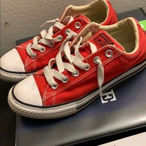Slip on red converses